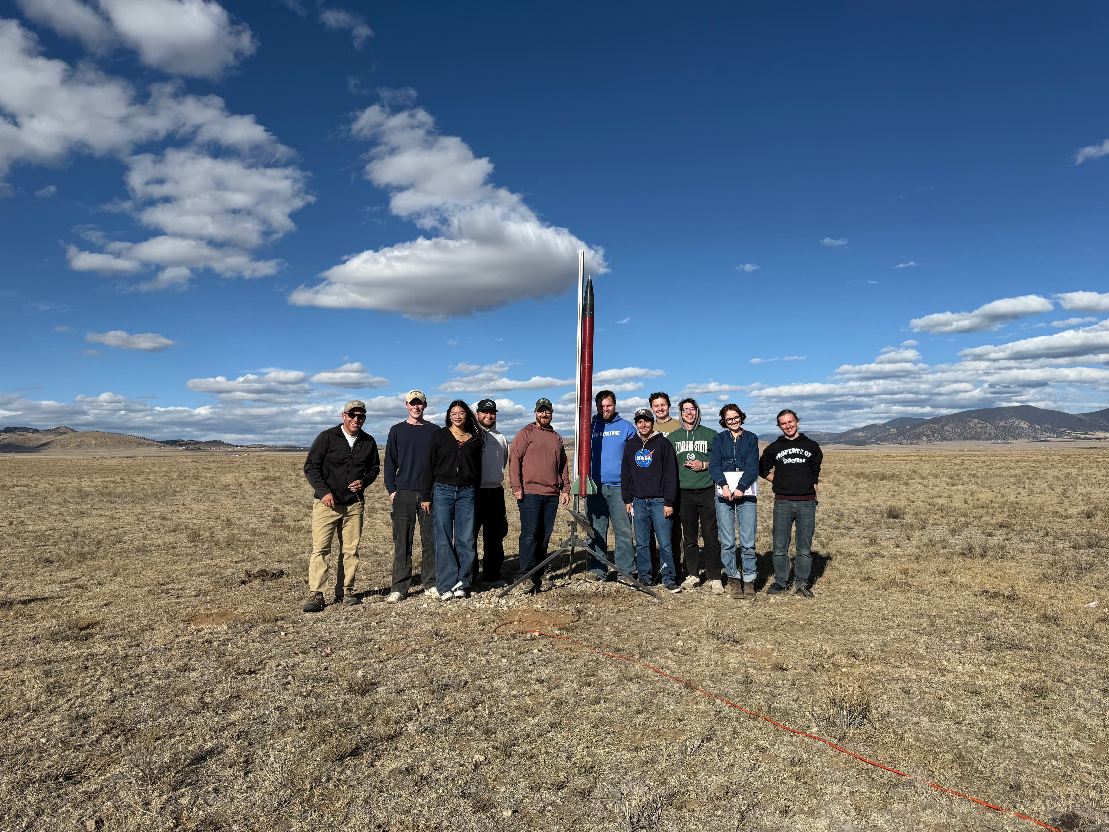 Team photo with subscale rocket